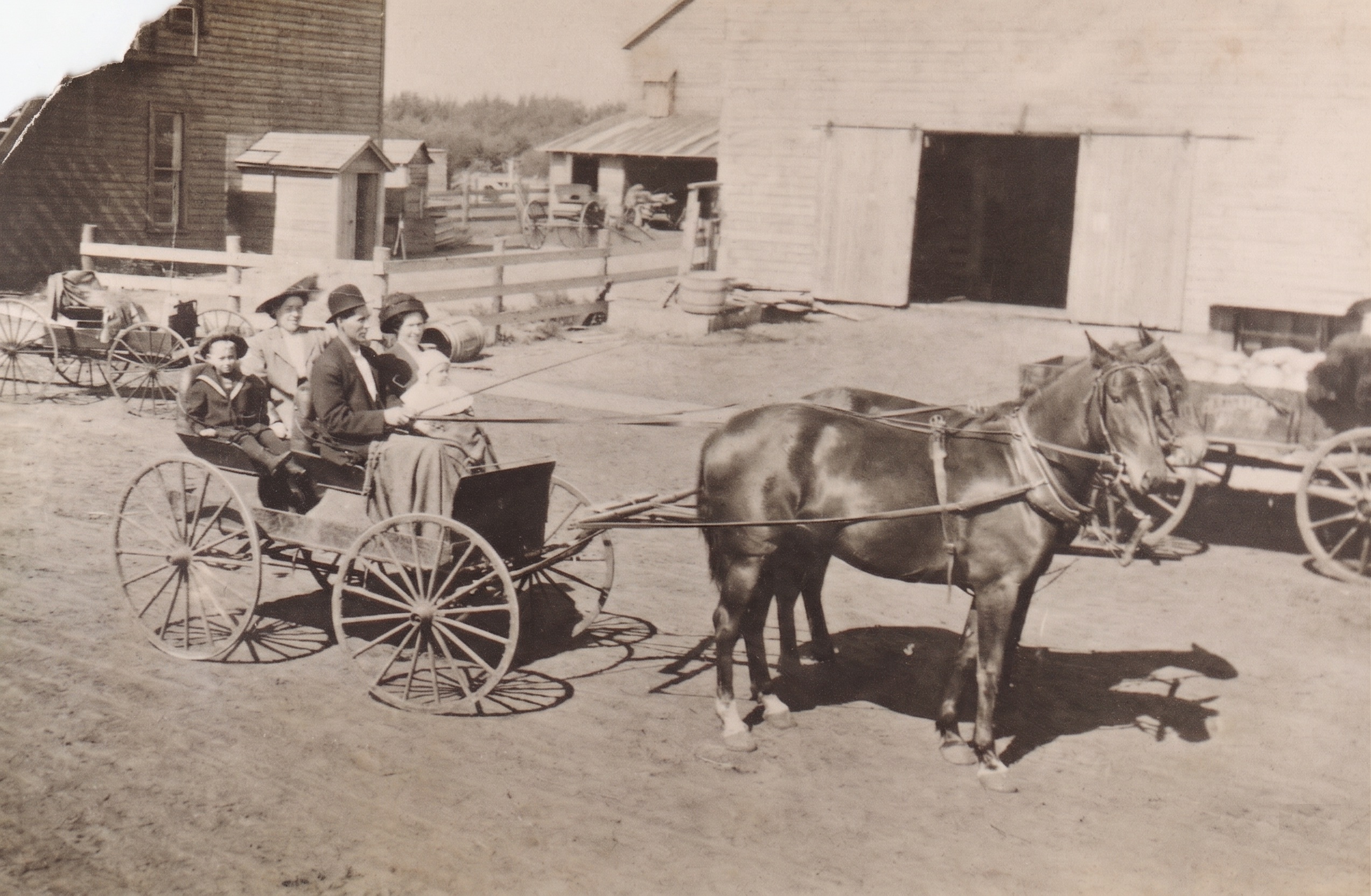 Family photograph including Peter, Olive, Dearle Dunning, and relatives identified in the source filename.