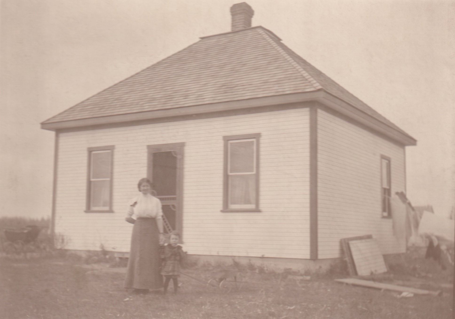 Photograph of Emily Davis with baby Peter Davis.