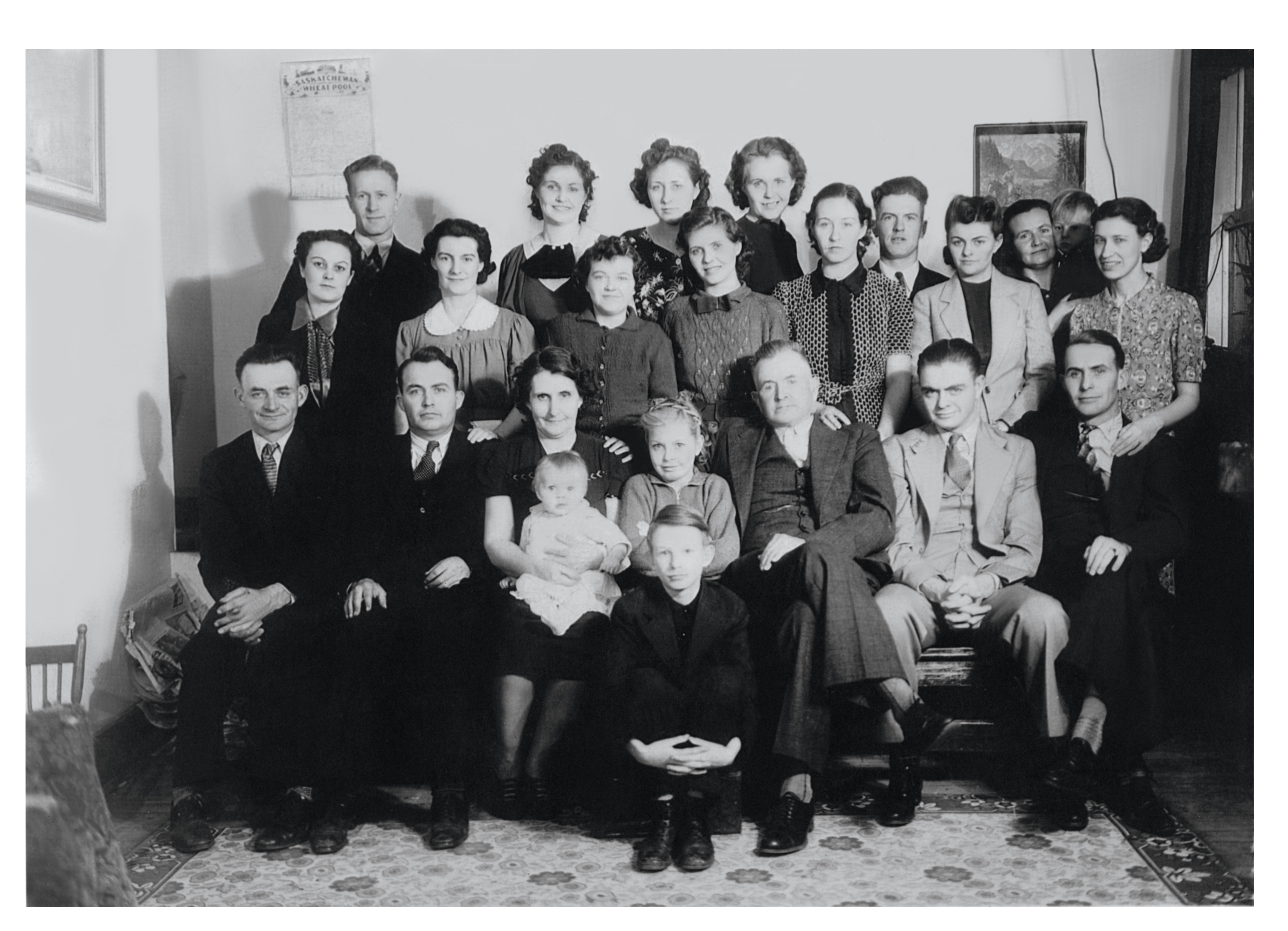 Large family group portrait of Leonard and Myrtie Nicholson with children and some children's spouses, about 1936.