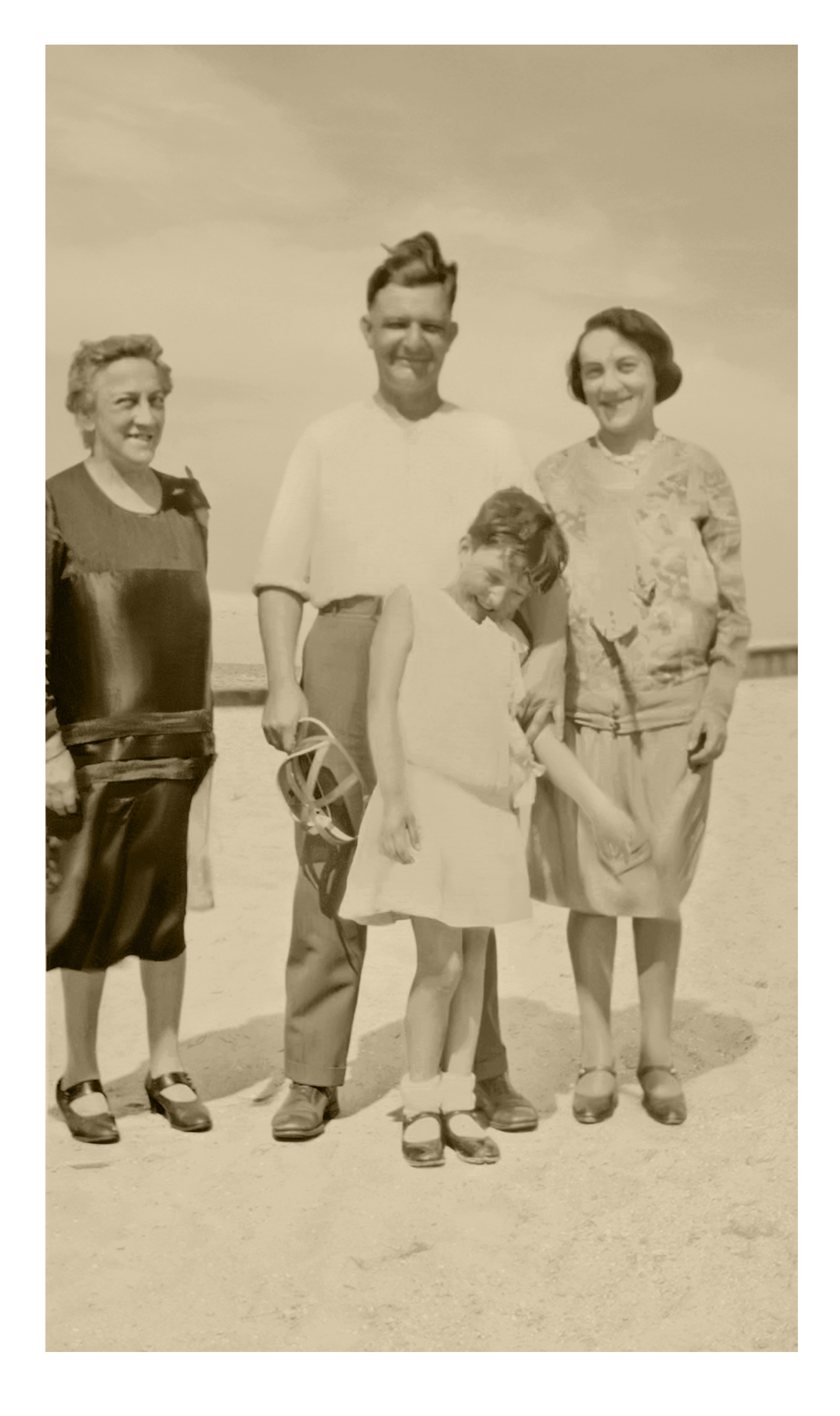Sadie Tabor with Russell Elmer Tenure, Ethel Tenure, and Mildred Elizabeth Tabor outdoors